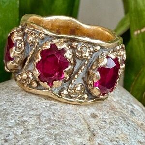 Sold.    14 karat gold vintage band